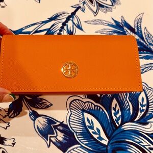 Brand new Tory Burch Bright Orange Wallet with Gold Logo